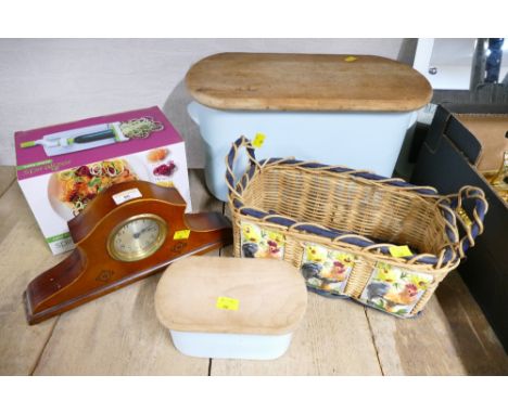 Wooden inlaid mantle clock, blue ceramic bread bin and butter dish, wicker basket etc 