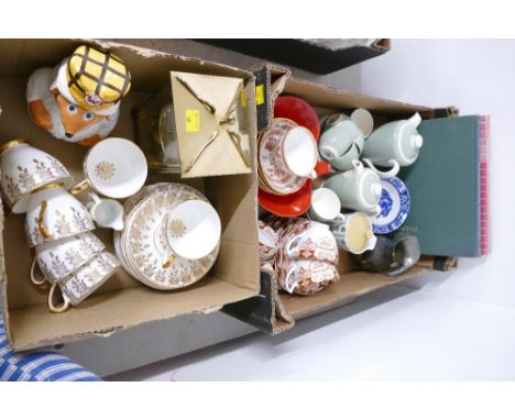 Two boxes of part tea sets, Poole pottery part coffee set, books, clock, Womble money box etc 