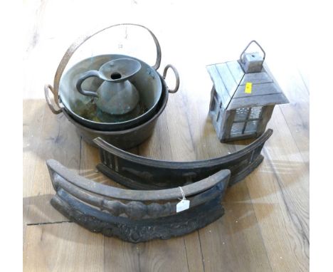 Two curved fire kerbs, two jam pans, lantern and jug 