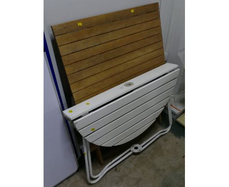 Two folding garden tables