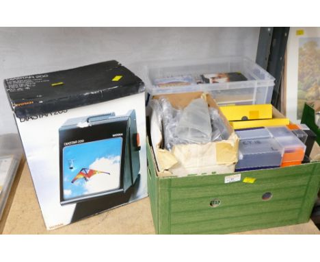 Boxed Wotan Diastar 200 slide projector, box of slides and DVDs