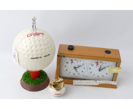 Novelty golf ball cigarette holder, golfing table lighter and "hanhart" chess clock