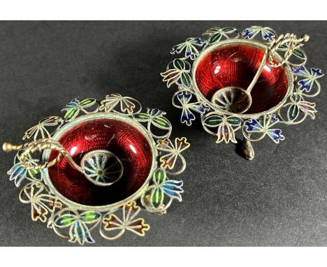 A pair of early 20th century Norwegian pliqué-a-jour enamel salt cellars, both stamped 925 and signed complete with a pair of