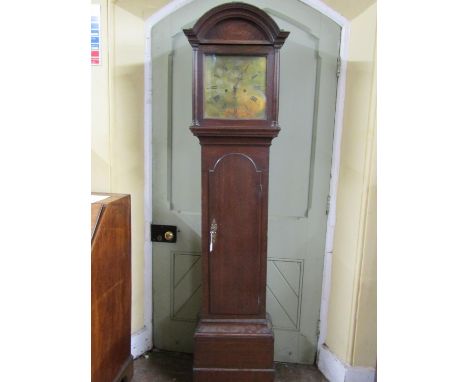 A Georgian oak longcase clock. the arched hood enclosing a square brass dial with eight day movement, subsidiary calendar and