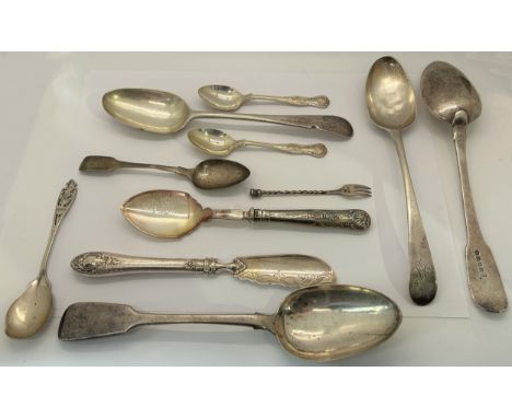 A mixed selection of 19th and 20th century silver pieces including two Georgian serving spoons, four dessert spoons, three na