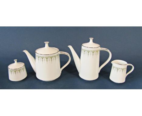A Noritake dinner, tea and coffee service repeating geometric detail in a green colourway 