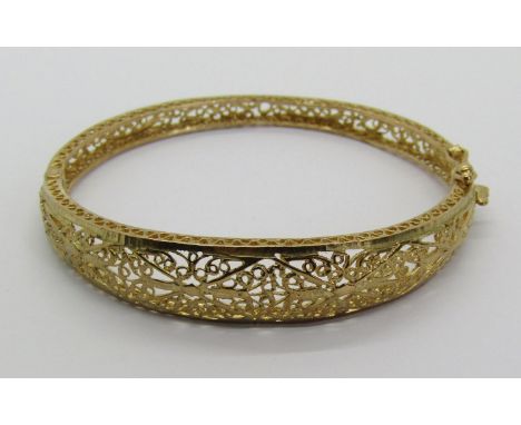 9ct openwork filigree hinged bangle, 11.7g 