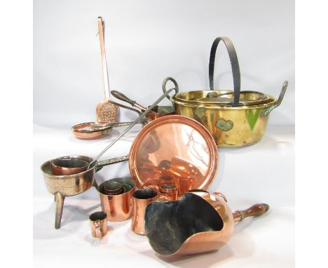 A collection of highly polished 19th century copper kitchen ware including saucepans, milk ladle, milk measures, a cereal sco