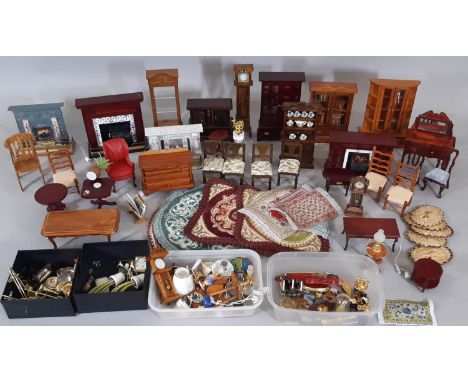 A collection of dolls house dining room / living room furnishings including tables, chairs, dressers, fireplaces (some wired)