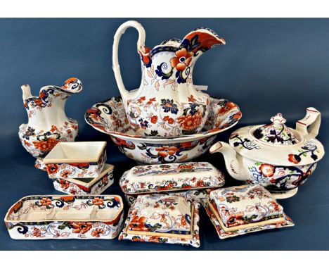 A collection of Amhurst Japan patterned toilet ware comprising a large jug and basin, toothpaste pot, further soap dishes, et