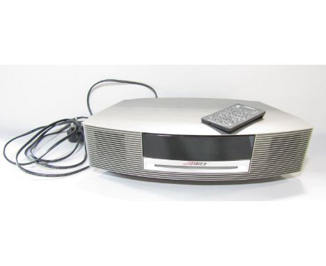 A Bose Wave Music System III, radio AM FM &amp; Digital, CD, MP3, Alarms and a remote control, operating manual, in  working 