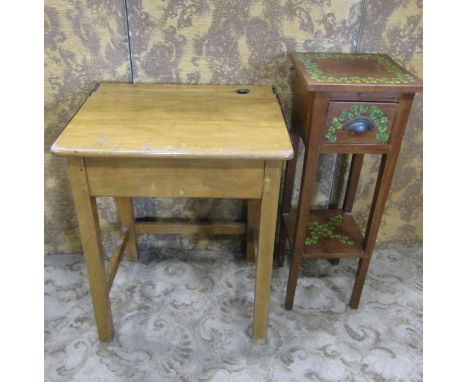 A vintage stained beechwood child's school desk with hinged lid and ink well, 57 cm wide x 46 cm deep x 72 cm high together w