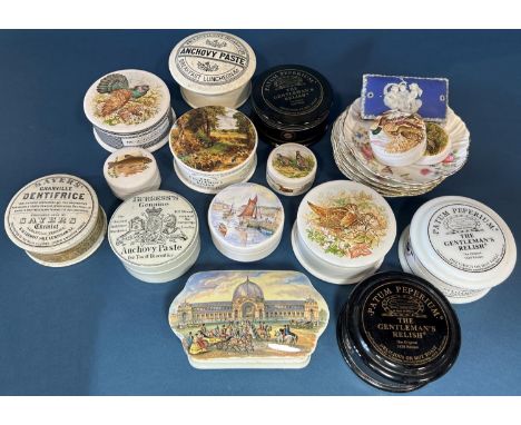 A collection of 19th century and later pots, pot lids including Sayers Dentifrice, two bird on nest tureens, together with an