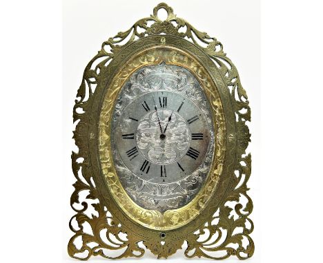 19th century easel clock, the casework with engraved and pierced detail, enclosing an oval engraved dial, 15cm max 
