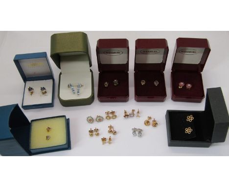 Collection of 9ct stud earrings of various design, to include a ruby and diamond cluster pair, a 9ct white gold blue gem and 