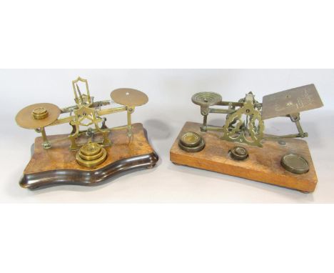 A Victorian postal scale and another scale, both with a selection of weights 