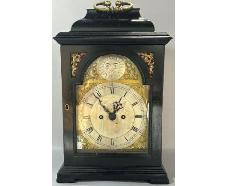 A Georgian bracket clock with ebonised case, the broken arch brass dial with silvered chapter ring, with two train fusee move