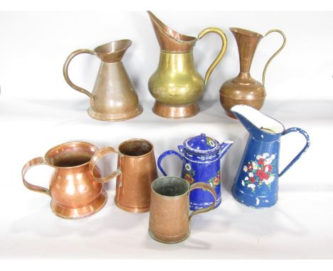 A mixed collection of 19th century and later copper jugs, tankards and enamelled and painted coffee pot and pitcher. 