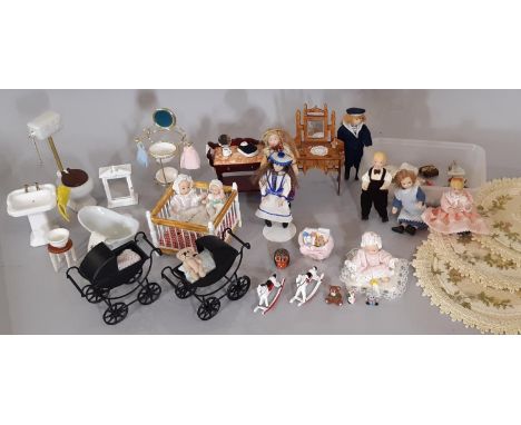 A collection of dolls house furnishings for bedroom, bathroom and nursery including period bathroom ceramic furniture, pram, 