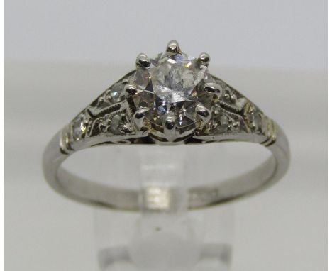 Platinum claw set diamond solitaire ring, 0.50ct approx, with further diamonds to shoulders, size G, 2.4g 