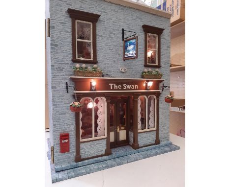 'The Swan'- a period style Public House dolls house comprising a front opening 3 storey building with stone effect front date