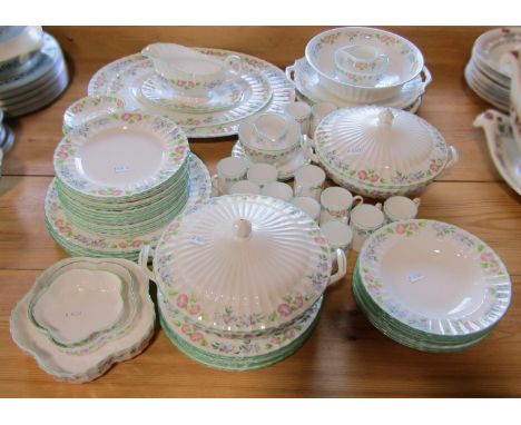 An extensive  collection of Royal Worcester "English Garden" dinner wares, with columbine &amp; pimpernel style borders withi