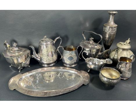 Two silver plated teapots, a Georgian style silver plated sauce boat, a plated serving dish, a candelabra, a further teapot a