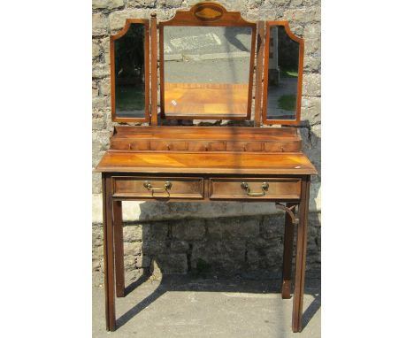 Georgian style dressing table with two frieze drawers, the raised back with five further doors and a triple mirror, 95cm wide