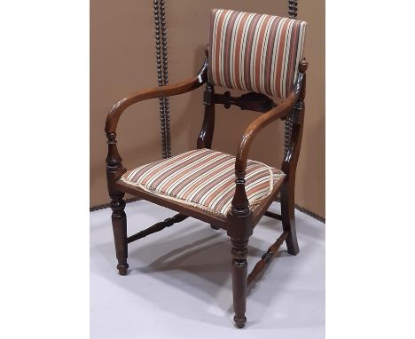 A regency countrymade elbow chair with upholstered seat and back panel 