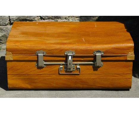 An antique steel travelling trunk with original wood grained finish and chrome mounts 