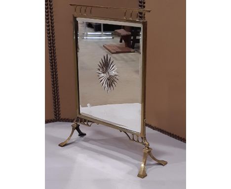 A Victorian brass and mirror panelled fire screen 