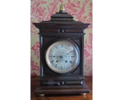 A mid Victorian period bracket clock with silvered dial and eight day striking movement 