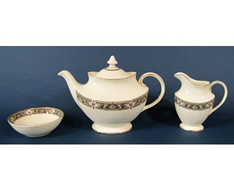 A Royal Doulton Camberley tea and coffeeware with floral fruit border in a soft blue including 8 cups and saucers, 2 coffee c