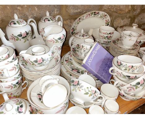 An extensive collection of Wedgwood Hathaway Rose pattern table ware comprising a coffee pot, teapot, tea cups, saucers, coff