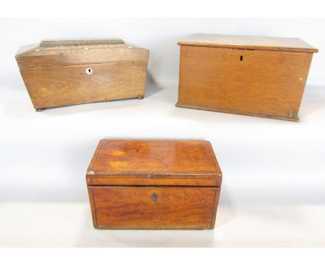 A 19th century oak sarcophagus tea caddy, mahogany tea caddy and a simple oak box with a hinged lid. 