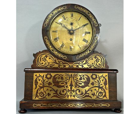 A Regency rosewood and brass inlaid bracket clock with brass dial with single train fusee movement, with subsidiary secondary