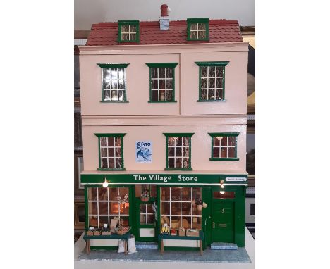 'The Village Store'- an impressive and finely detailed dolls house shop in early to mid 20th century style comprising 4 store