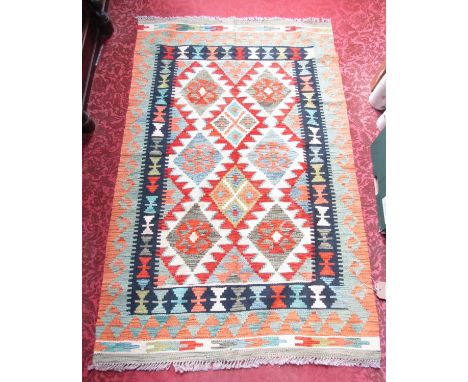 A Chobi Kilim, with a central panel interspersed with interlocking stepped medallions 155 x 101cm approx. 
