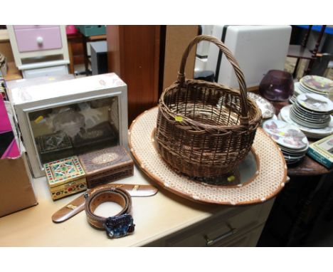 A wicker basket; framed mirror; trinket boxes; framed shell; boomerang etc