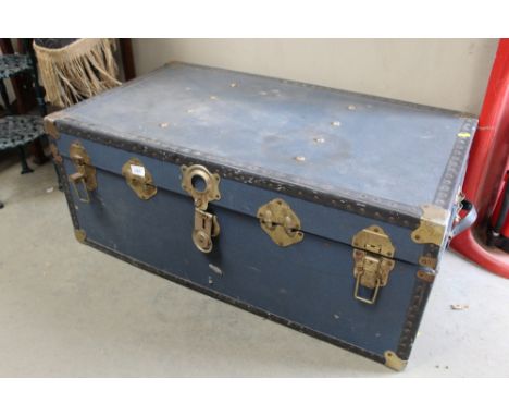 A blue travelling trunk