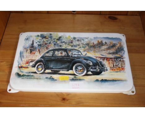 An enamel plaque depicting a VW Beetle 
