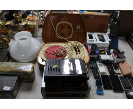 An Oscar Senior turntable and a portable cassette tape recorder 