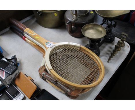 Three vintage tennis rackets to include Dunlop and Slazenger
