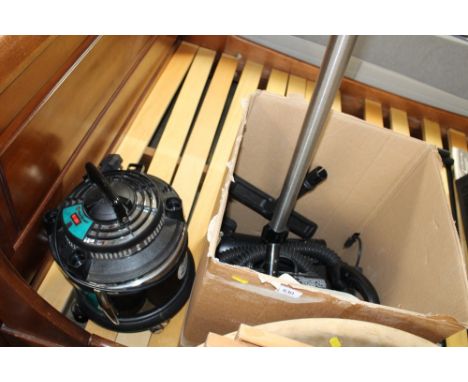 An R Morgan vacuum cleaner and attachments