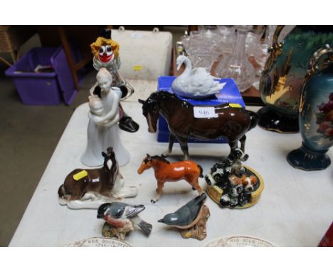 Two Beswick model horses; a Russian model horse; a Beswick model of a bullfinch; another Beswick model of a nuthatch; a W Goe