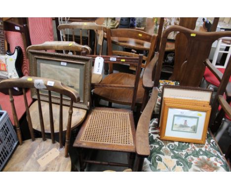 An oak ladder back dining chair together with a bar back and cane seated chair