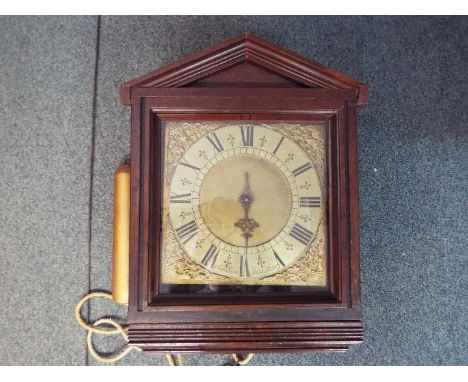 An early 18th century single-handed 30-hour birdcage longcase clock movement with square brass dial signed to the silvered ch