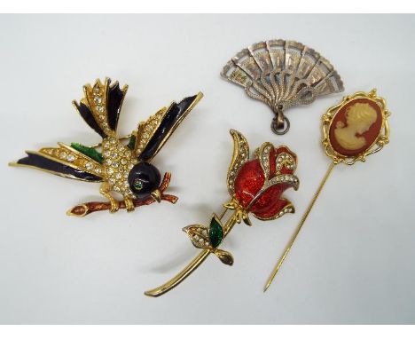 Costume jewellery to include a Sphinx enamel bird brooch # 9924, enamelled flower brooch, yellow metal cameo stick pin and si