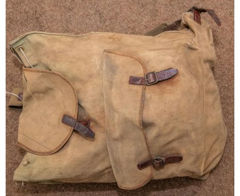A civilian rucksack, 2 1903 pattern ammunition bandoliers, a civilian cartridge belt, various straps and waist belts etc also