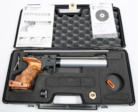 A .177" Rohm Twinmatic "Top" Model pre charged pneumatic match target pistol, number 0589790, near VGC, with single shot and 